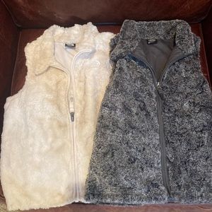 Toddler girls size 6 The North Face soft vests. One grey/black one cream/ivory